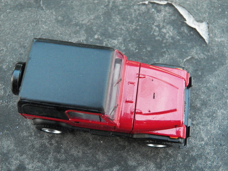 Illustration for article titled LaLD Car Week 'lil Red YJ - Greenlight Jeep Wrangler 1:64